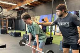 baseball athlete working on his posture at symbiotic training center